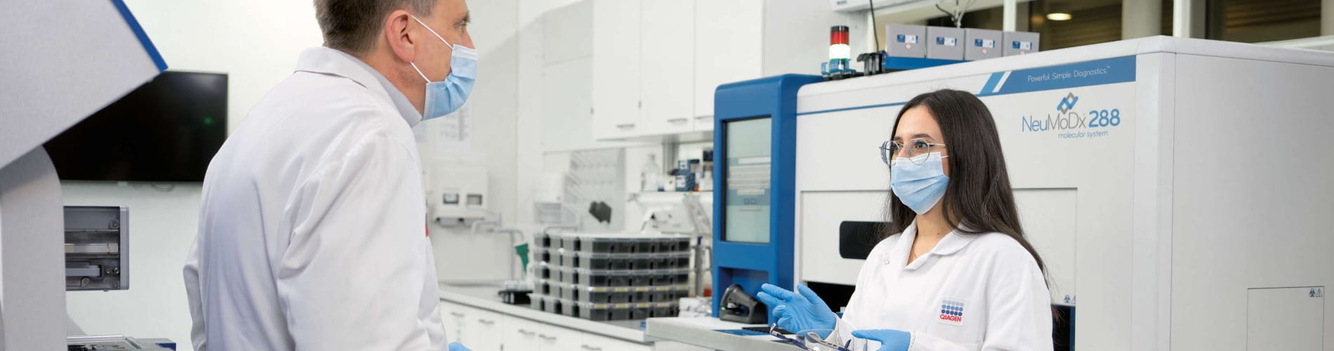 Two colleagues talking in a lab